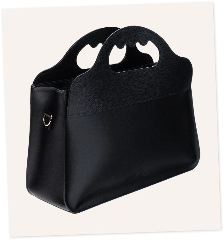 Sac en cuir revalorisé (synderme) noir Made in France avec une anse ergonomique.